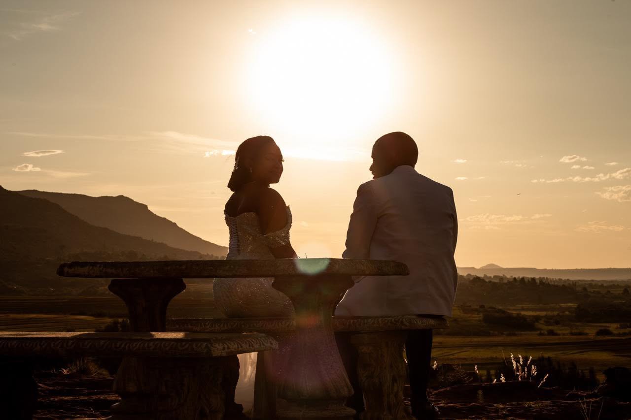 A wedding couple enjoying a golden sunset at The Oxenhill